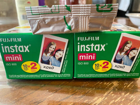 Fujifilm film boxes inside small case showing storage solution benefit protected transport