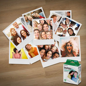 Fujifilm Instax Square film with white frame for personalized captions.