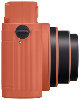 Fujifilm Instax Square SQ1 Terracotta Orange in hand shows 1:1 square prints capability.