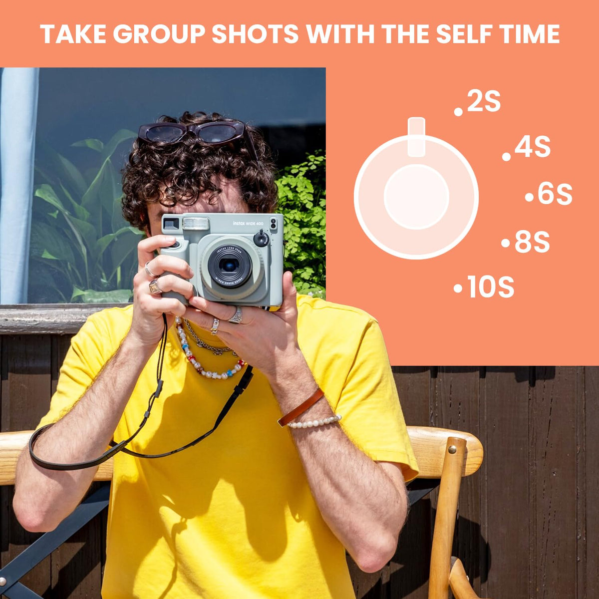 AA batteries power the Instax Wide 400 for portable instant photography.