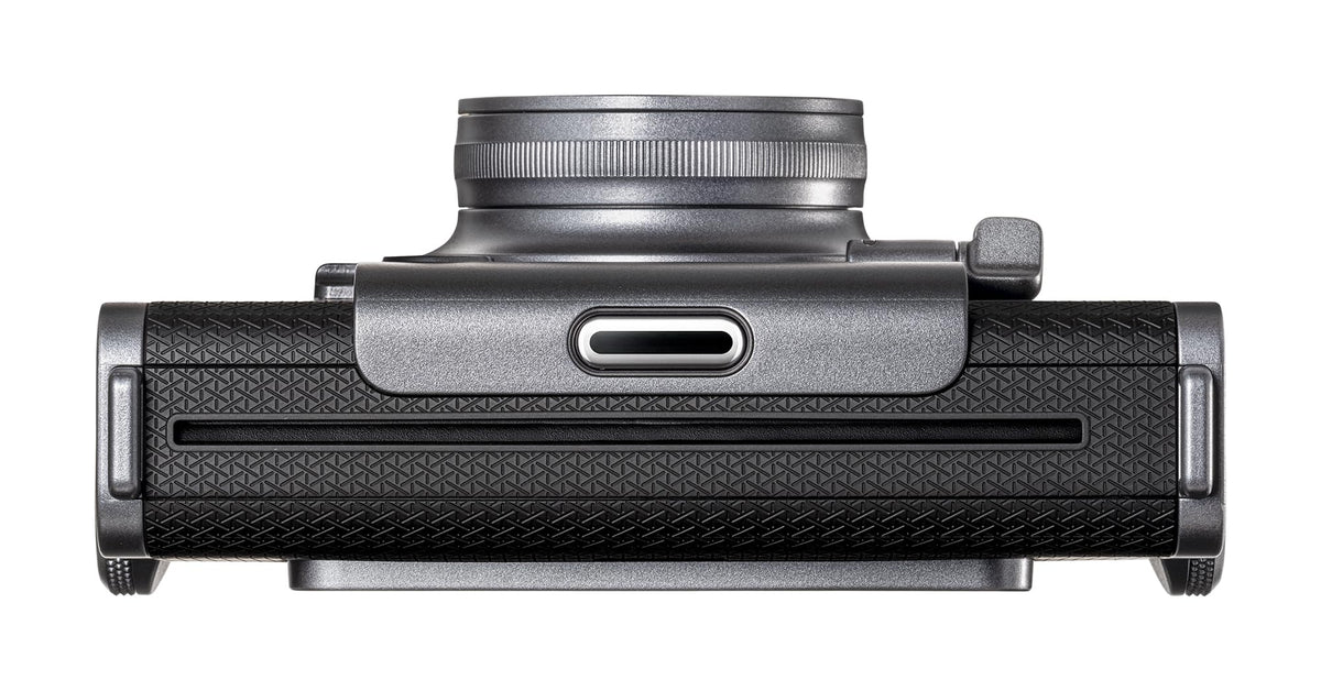 Fujifilm Instax Wide Evo control dial highlights lens and film effects options.