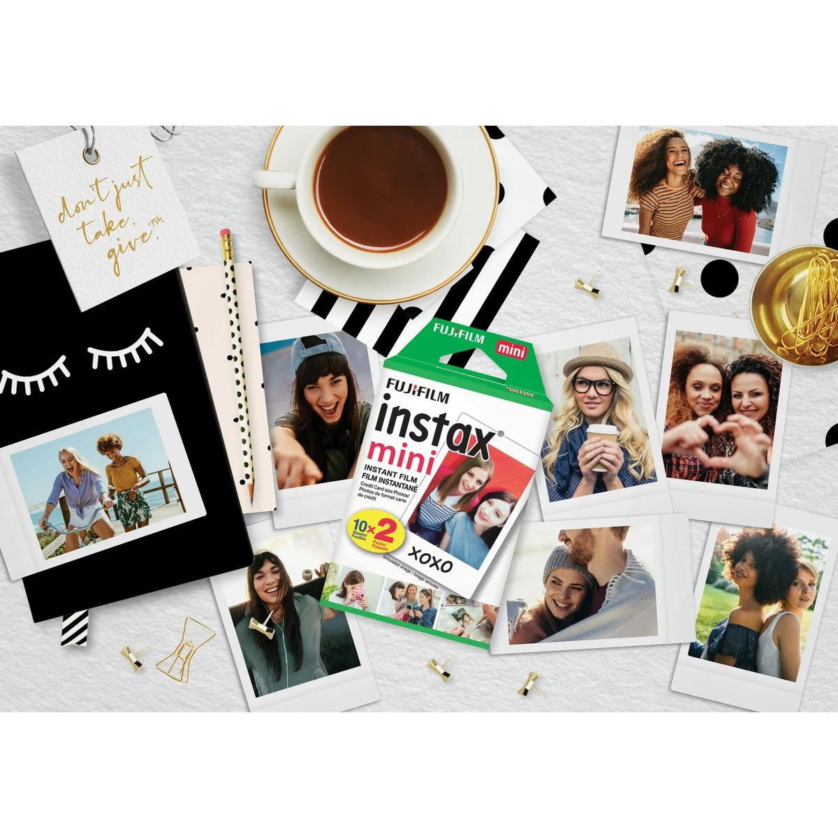 Fujifilm Mini instant photo emerging from camera showing on-moment development