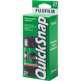 Fujifilm QuickSnap in user’s hand at festival for candid moment capture