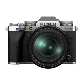 Fujifilm X-T5 silver camera front with dial controls for travel shooting.