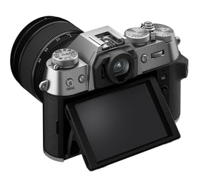 Fujifilm X-T50 silver side view shows ergonomic grip for stable shots