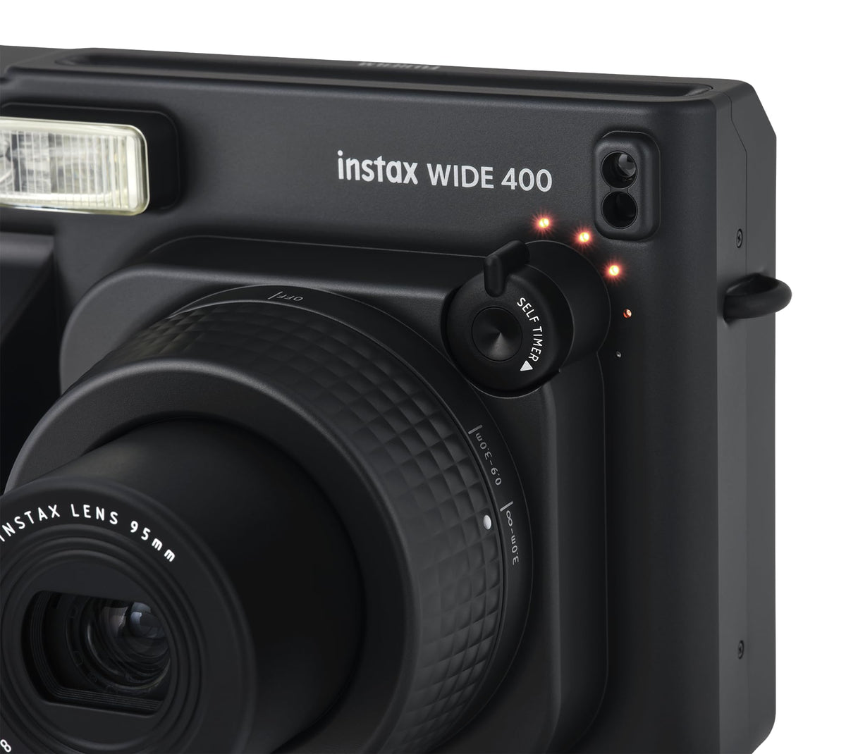 FUJIFILM Instax Wide 400 close-up lens attachment for dramatic macro detail.