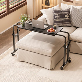 Furist overbed table lockable wheels keep it secure at bedside or chair.