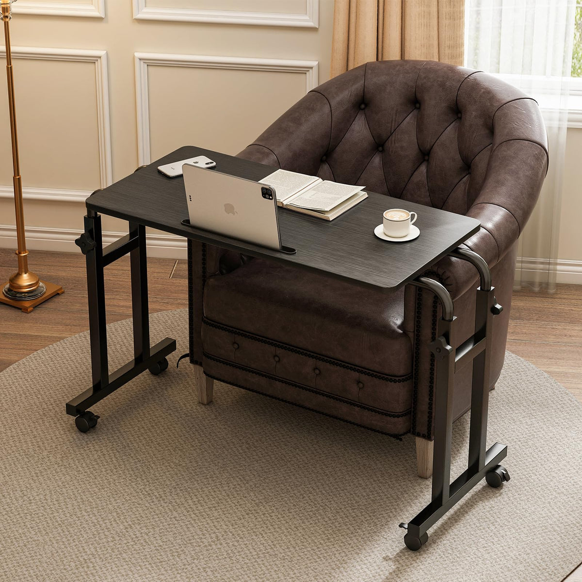 Furist overbed table with wheels for smooth bedside meals and work.