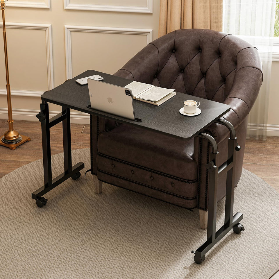Furist overbed table with wheels for smooth bedside meals and work.