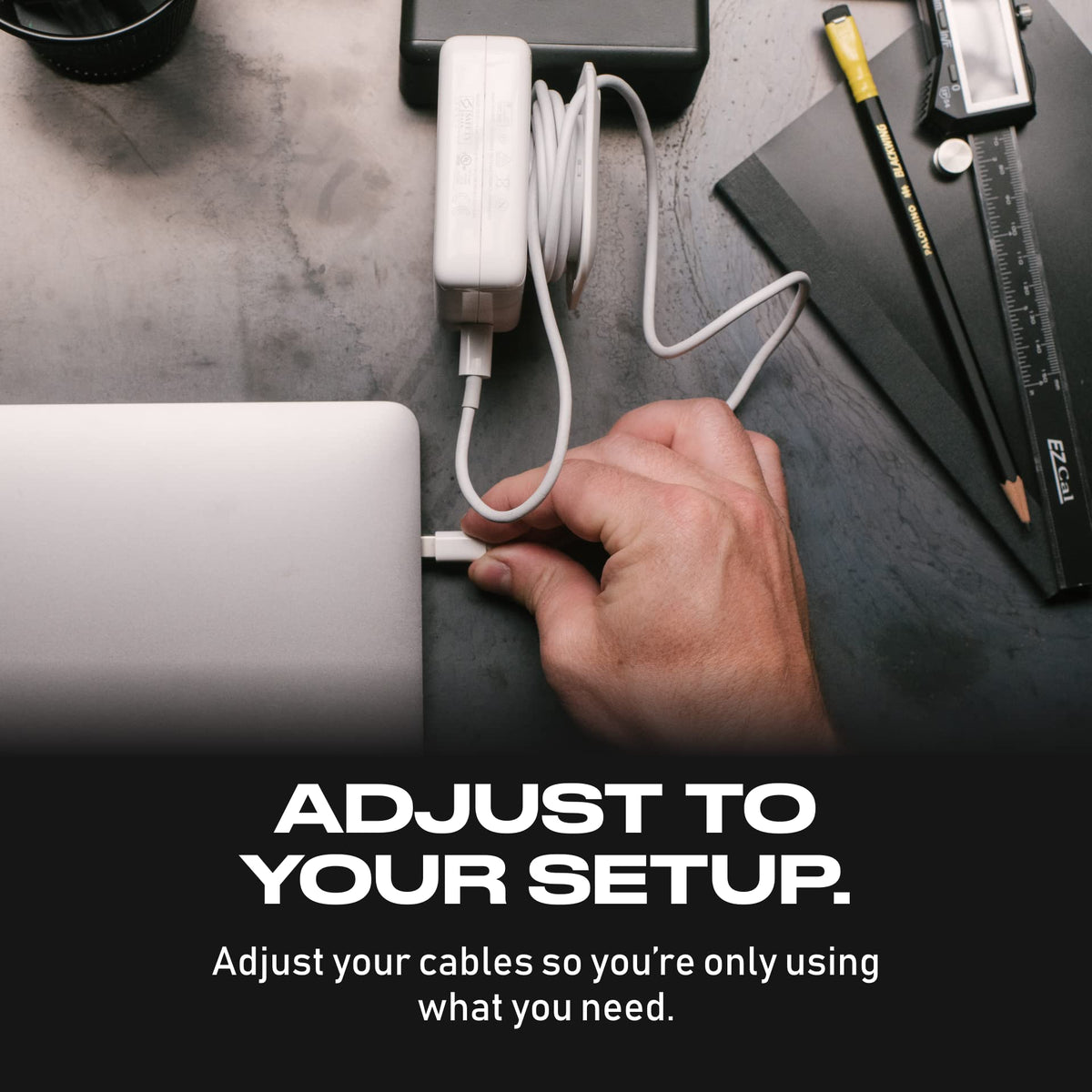 Fuse Side Kick beside a MacBook illustrating compatibility and tidy desk setup