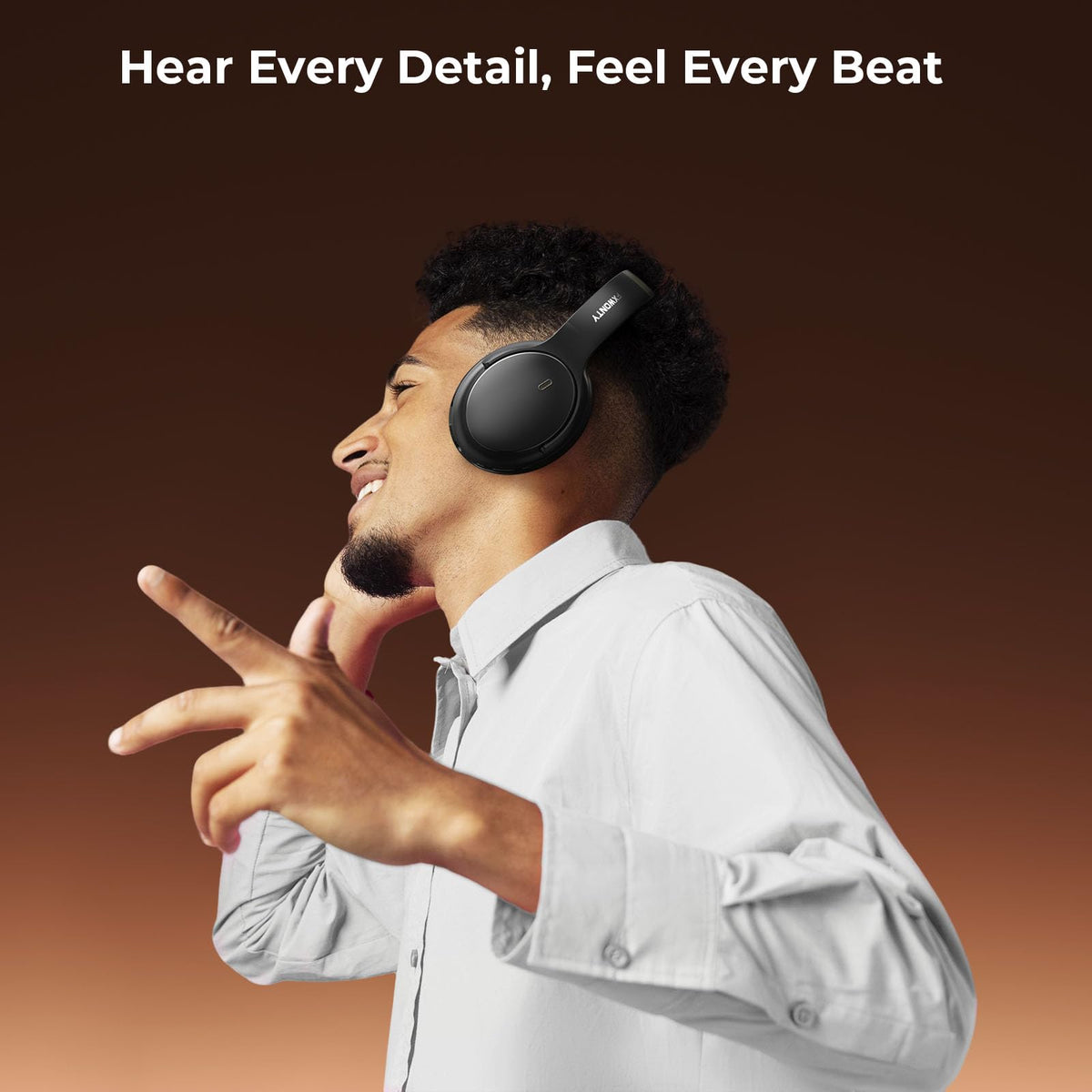 FXWONTY headphones worn during travel with zero‑pressure headband on