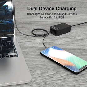 GAKUS 65W charger in-use setup powering Surface Pro and phone