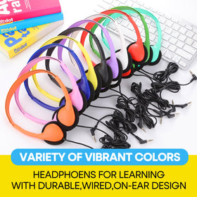 Gaosen headphones next to notebook showing size and scale for kids