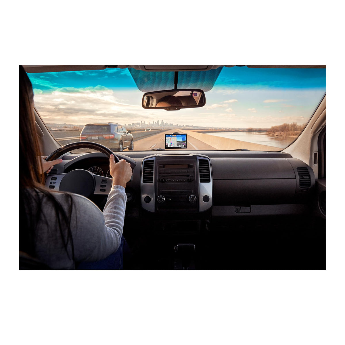 Garmin Drive 53 bundle charger in use powering devices on road trips
