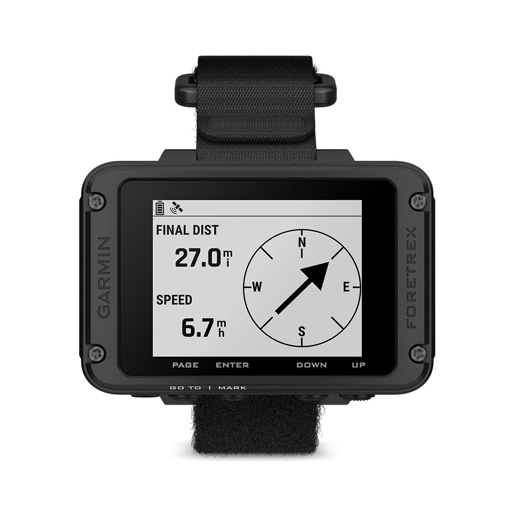 Garmin Foretrex 801 wrist-mounted GPS navigator with readable monochrome display in varied lighting.