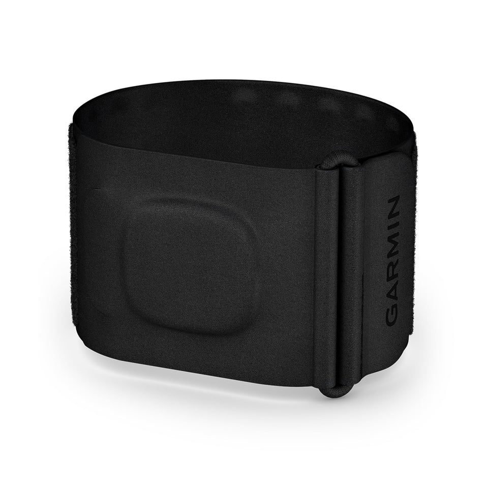 Garmin Index Sleep Monitor worn on the upper arm for comfortable all-night tracking.
