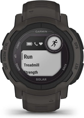 Garmin Instinct 2 Solar solar charging tilt — demonstrates extended outings.