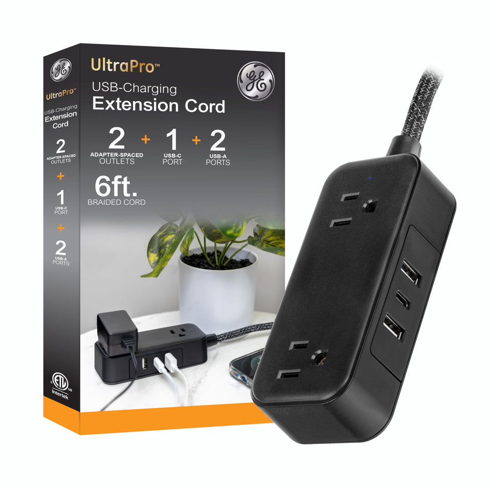 GE flat plug power strip with USB ports powering devices while saving space.
