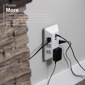 GE plugged into wall to show size and scale for tight-space setups