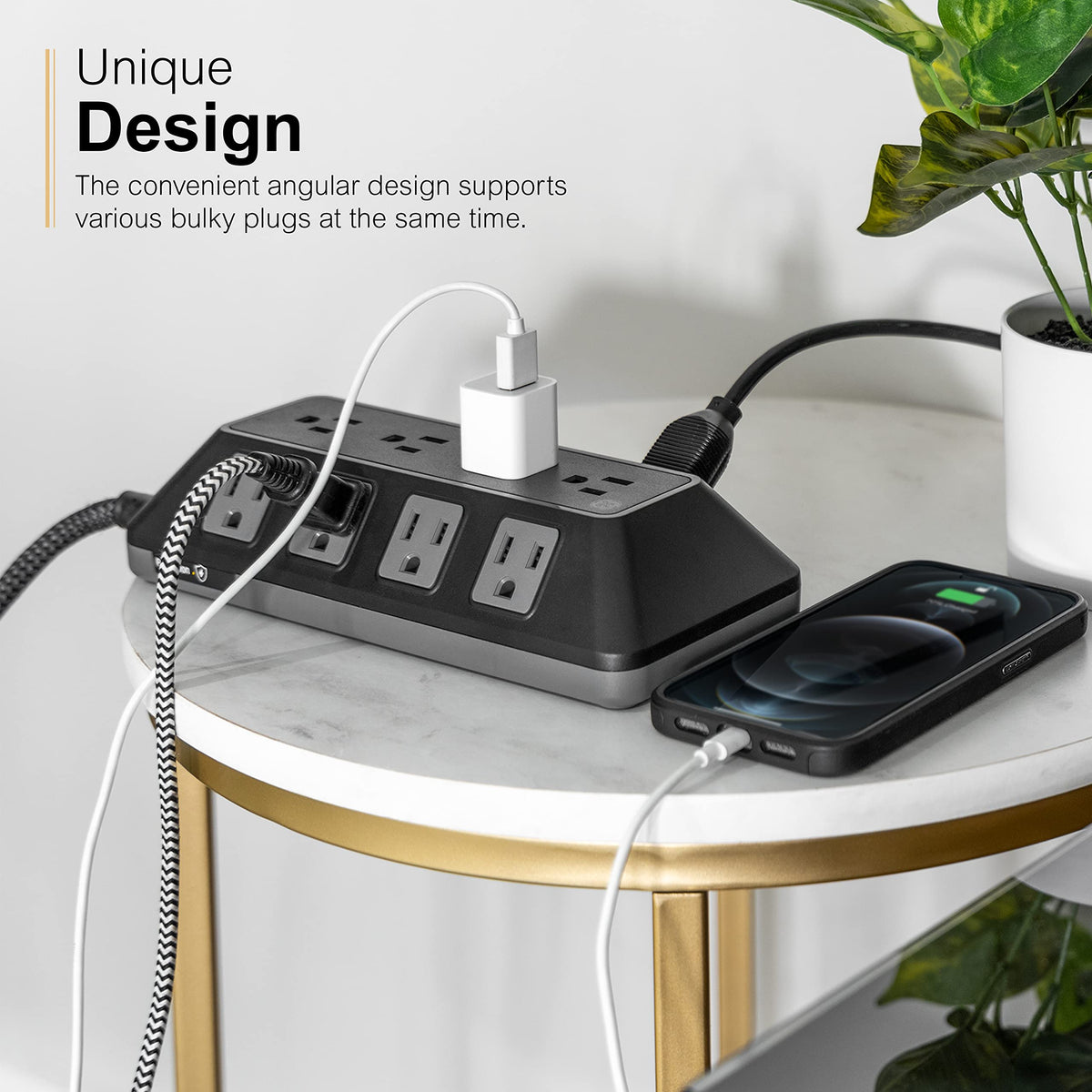 GE UltraPro ADAPT flat plug tucked behind furniture for tight spaces.