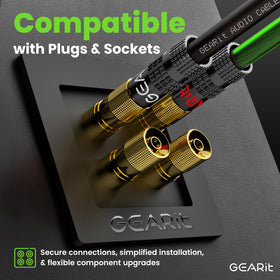 GEARit cable uncoiled beside a measuring tape demonstrating 100 ft scale