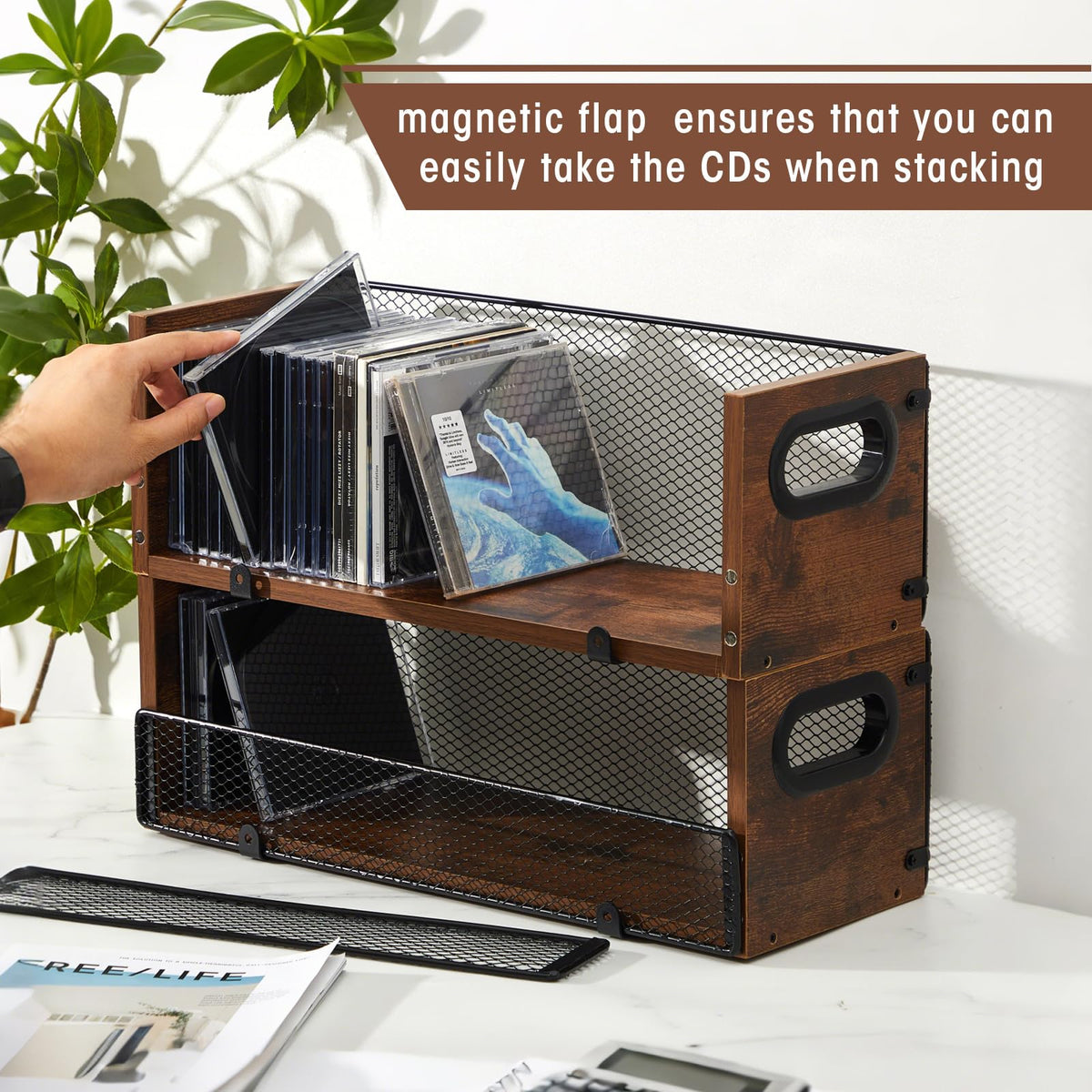 Geelin opened rack loaded with CDs showing organized display and accessibility benefit