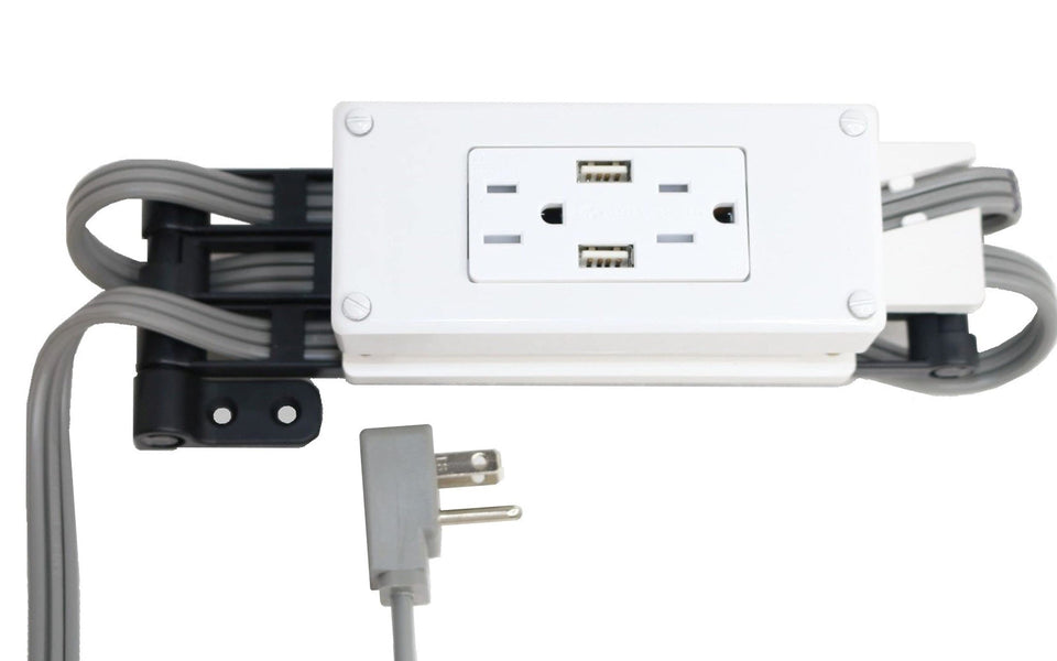 Generic compact in-drawer outlet with cord-management arm fits slim drawers, saving countertop space.