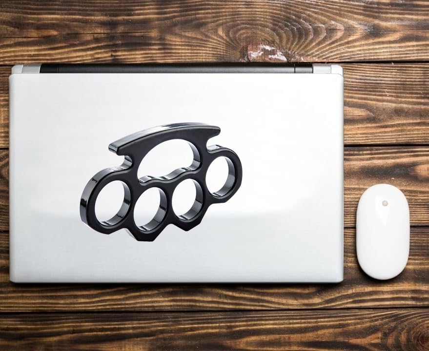 Generic brand knuckles decal applied to car bumper demonstrating outdoor adhesion benefit