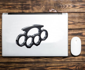 Generic brand knuckles decal applied to car bumper demonstrating outdoor adhesion benefit
