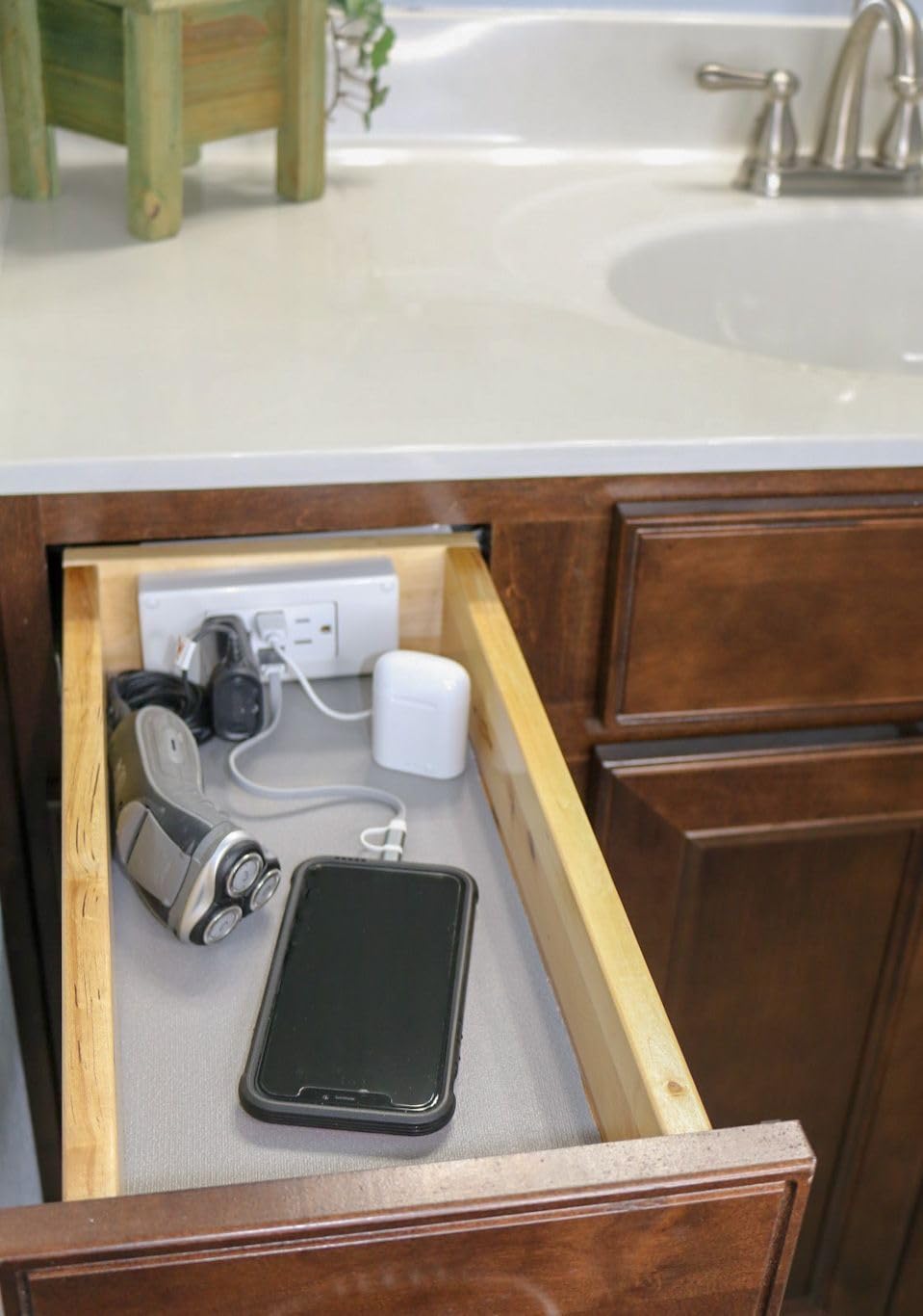 Generic tamper-resistant outlets enhance safety in drawer installations.