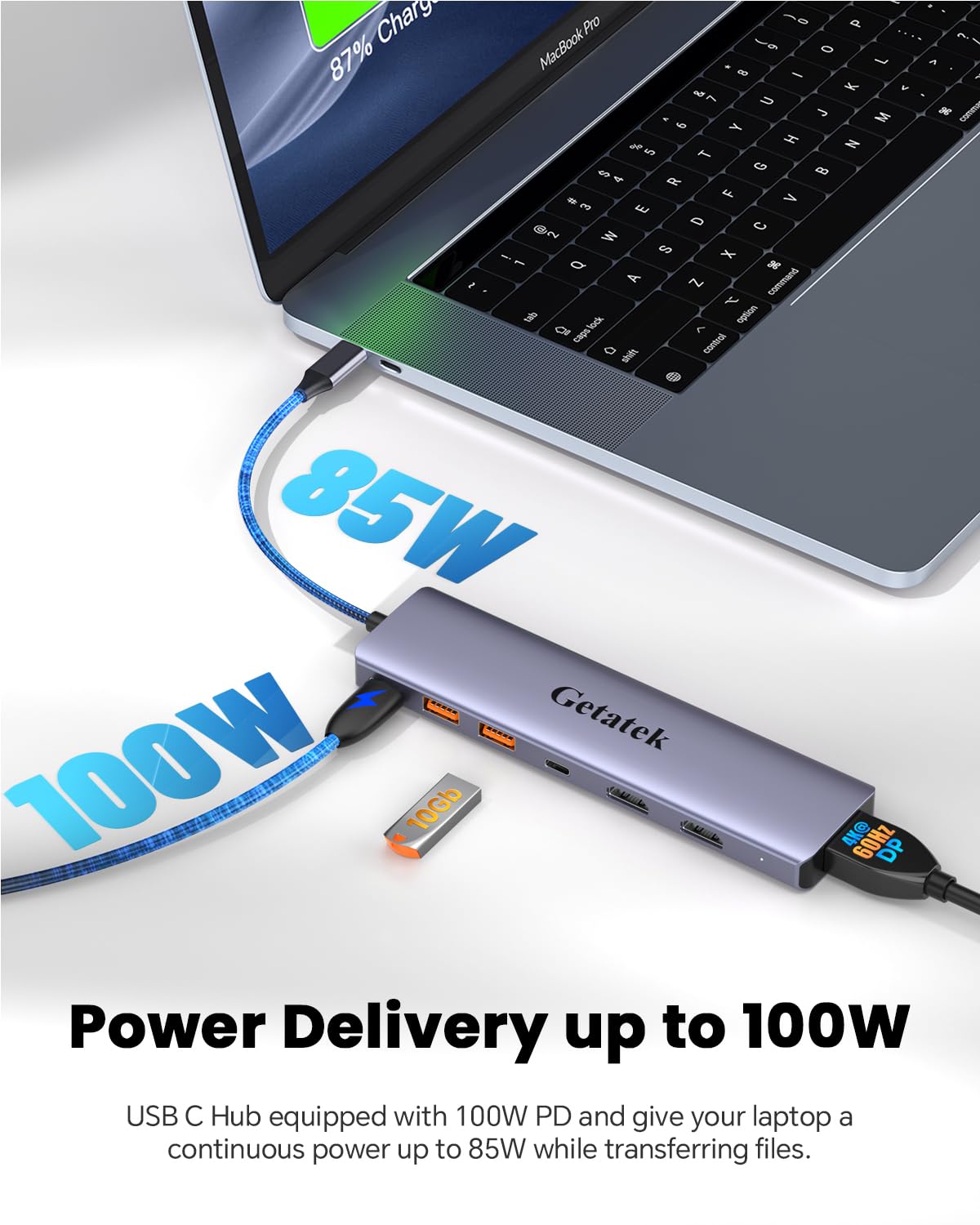 Getatek dock beside notebook for scale to show compact footprint and portability benefit