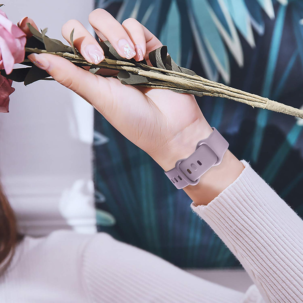 Getino pink band on wrist showing breathable silicone and secure clasp