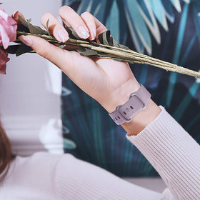 Getino pink band on wrist showing breathable silicone and secure clasp