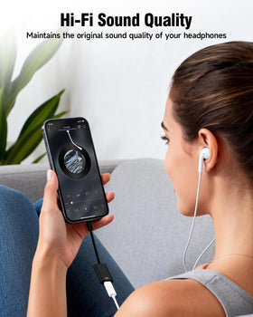 GetsISKON USB-C to Lightning adapter in use charging and listening on a device