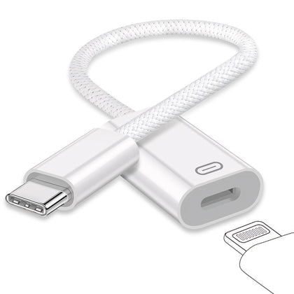 GetsISKON USB C to Lightning adapter on desk enabling versatile charging and audio use