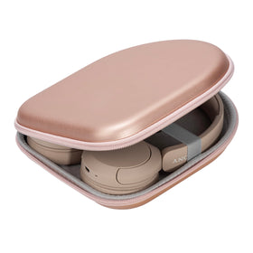 Ginsco rose gold hard shell case close-up showing PU leather texture for protection.