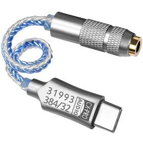 Girftu CX‑PRO plugged into smartphone, clean audio output for calls and music