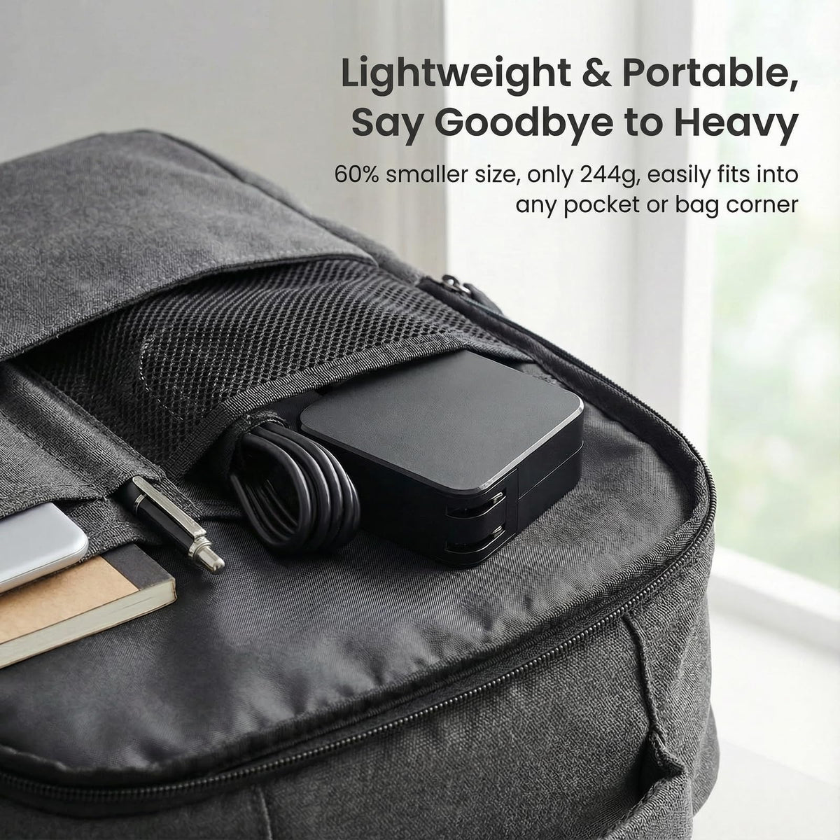 GKLSPL adapter next to smartphone to show scale, illustrates portable weight advantage
