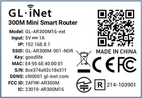 GL.iNet box with cables and manual demonstrating included accessories