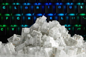 GLORIOUS Kailh Box White pack beside ruler showing 120-count and parts readiness