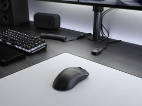 GLORIOUS Model O 2 Pro weight comparison showcasing about 57g body.