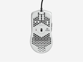 GLORIOUS Model O on gaming desk setup showing white aesthetic, coordinated look