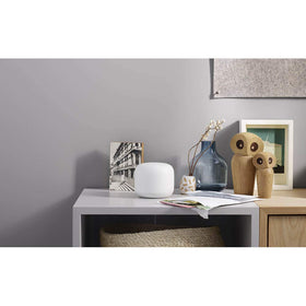 Google Nest Wifi coverage up to 4,400 sq ft illustration showing broad, reliable reach.