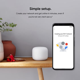 Google Nest WiFi Point 1 front view with built-in speaker and control area.
