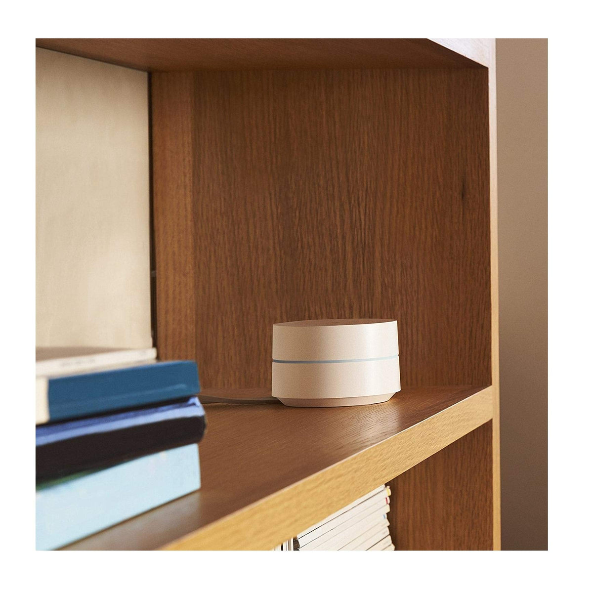 Google WiFi beside a smartphone showing scale and placement benefit