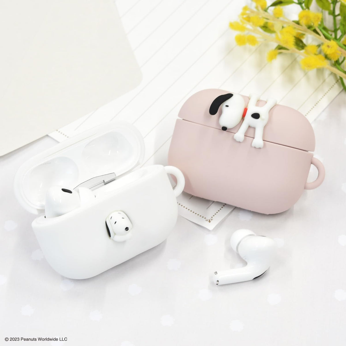 Gourmandise Peanuts AirPods Pro 2 case is travel-ready and protective for on‑the‑go use.