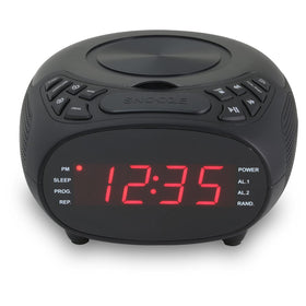 GPX CC318B on bedside table with CD inserted, demonstrating dual alarms and dimmer for softer nights