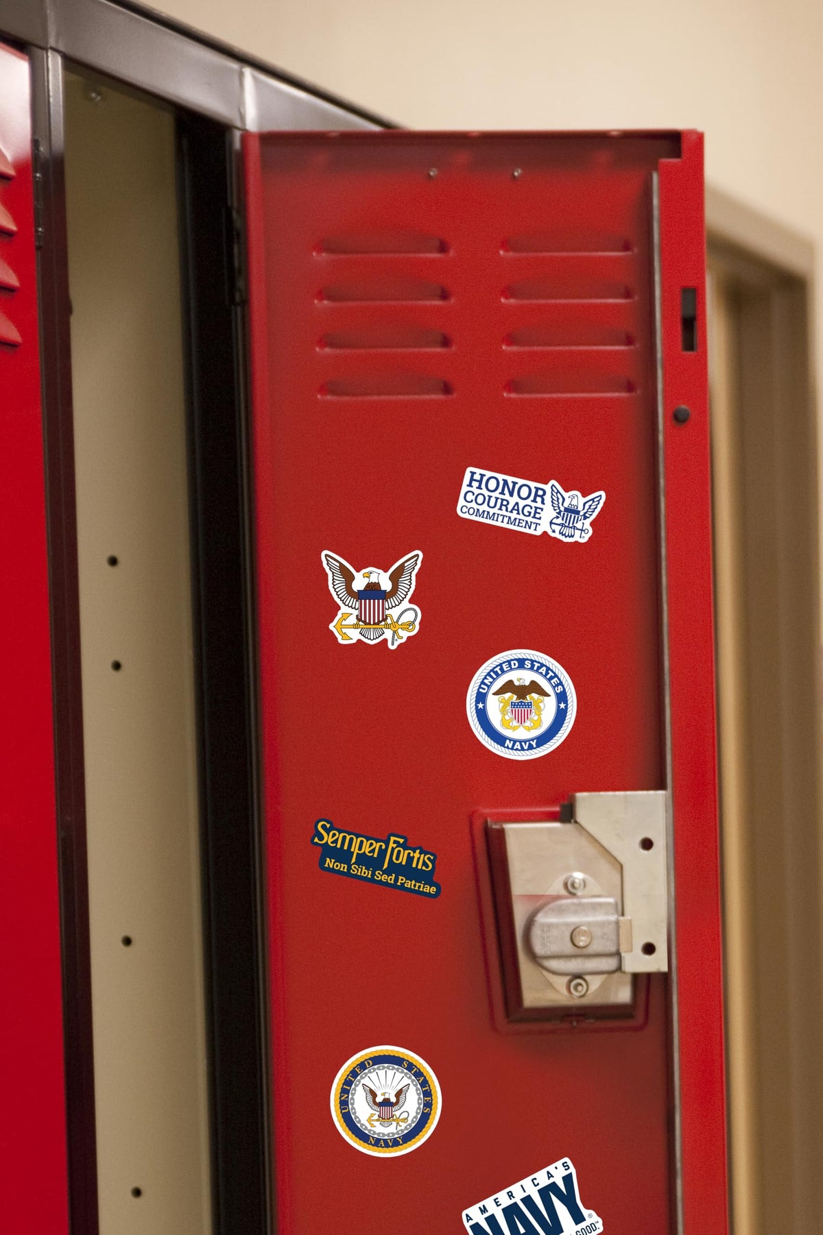 GRAPHICS & MORE large die-cut navy stickers highlight durable, high-visibility accents on surfaces.