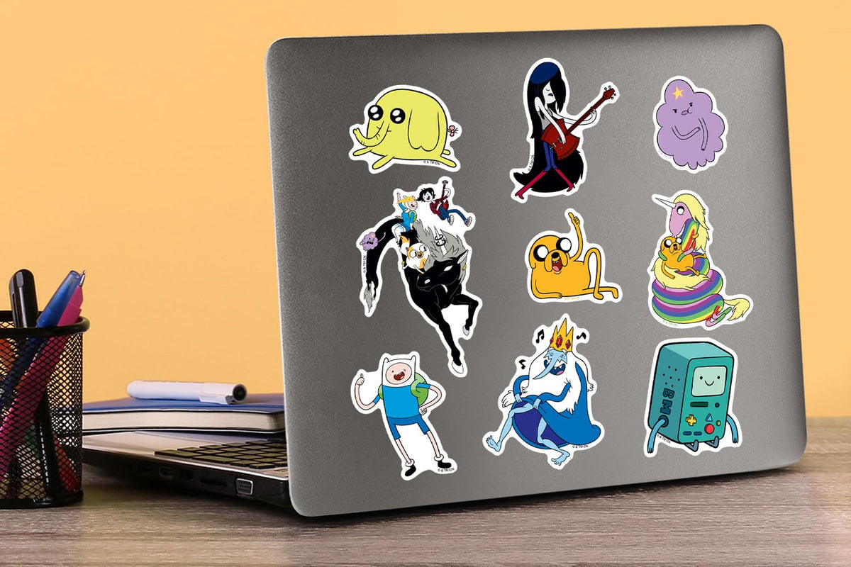 GRAPHICS & MORE Adventure Time sticker set on tablet screen for colorful personalization.