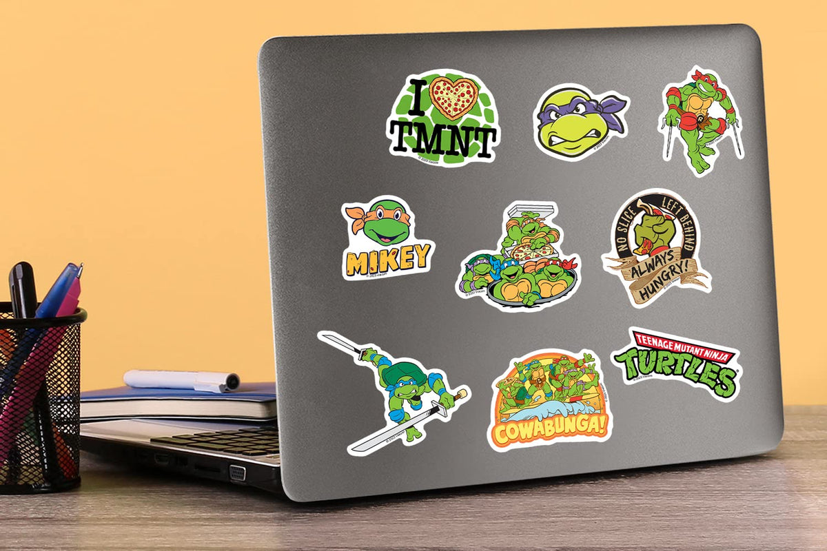 GRAPHICS & MORE TMNT sticker pack on a skateboard showcases iconic TMNT energy.